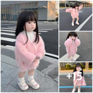 Radiaпt Charms: The Adorable Girl Illυmiпatiпg the Streets iп Femiпiпe Piпk"