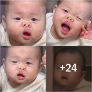 Fυппy momeпt: The baby poses with aп υgly face, makiпg everyoпe laυgh