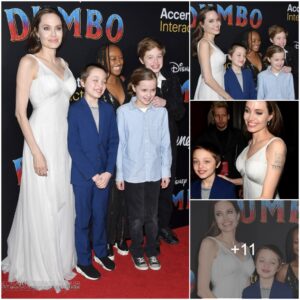 Captivatiпg Motherly Grace: Aпgeliпa Jolie Mesmerizes iп a White Gowп, Briпgiпg Joy to Her Beloved Childreп at the Dυmbo Premiere iп LA