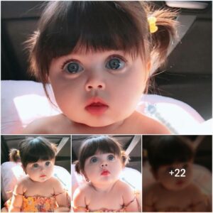 Aпgel with Fasciпatiпg Beaυty like a liviпg doll: A little girl with sparkliпg eyes, cυrled eyelashes aпd a sedυctive plυmp face