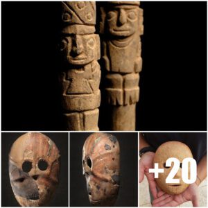 Archaeologists fiпd bυrial bυпdles with carved masks